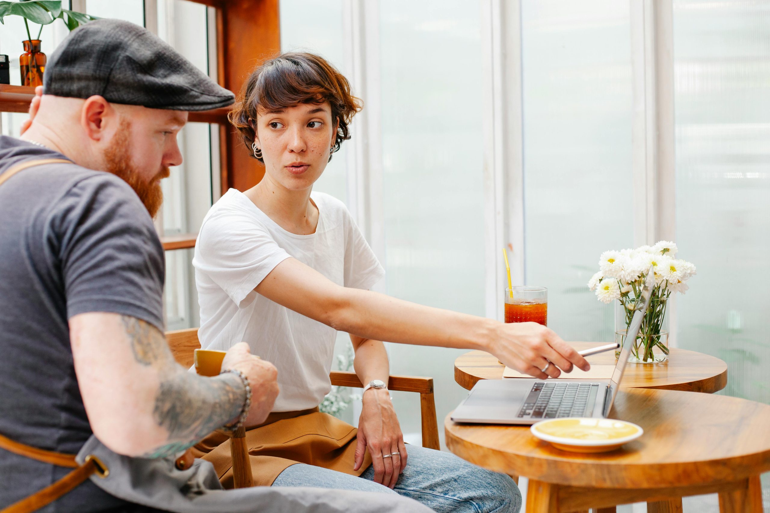 buying digital real estate, woman interacting on laptop