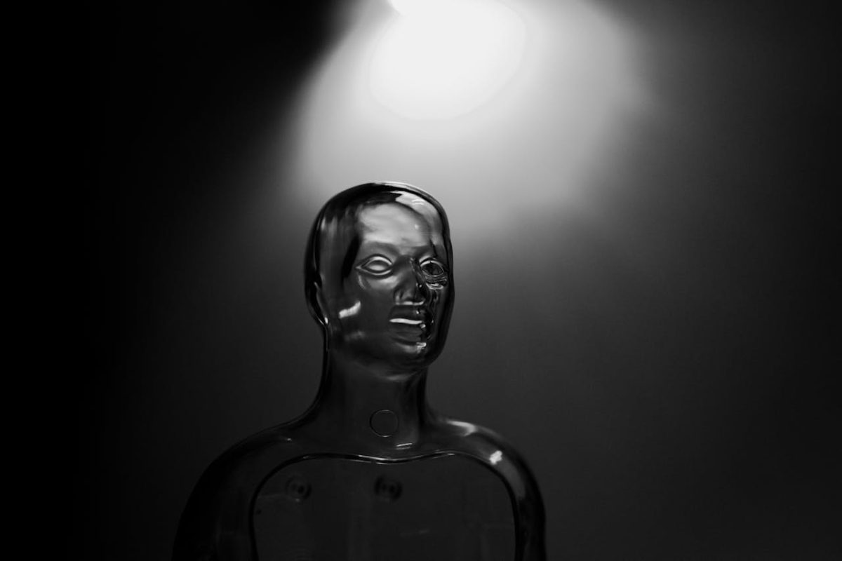 black and white photoof a transparent mannequin Exoskeleton Reasoning For Language Models
